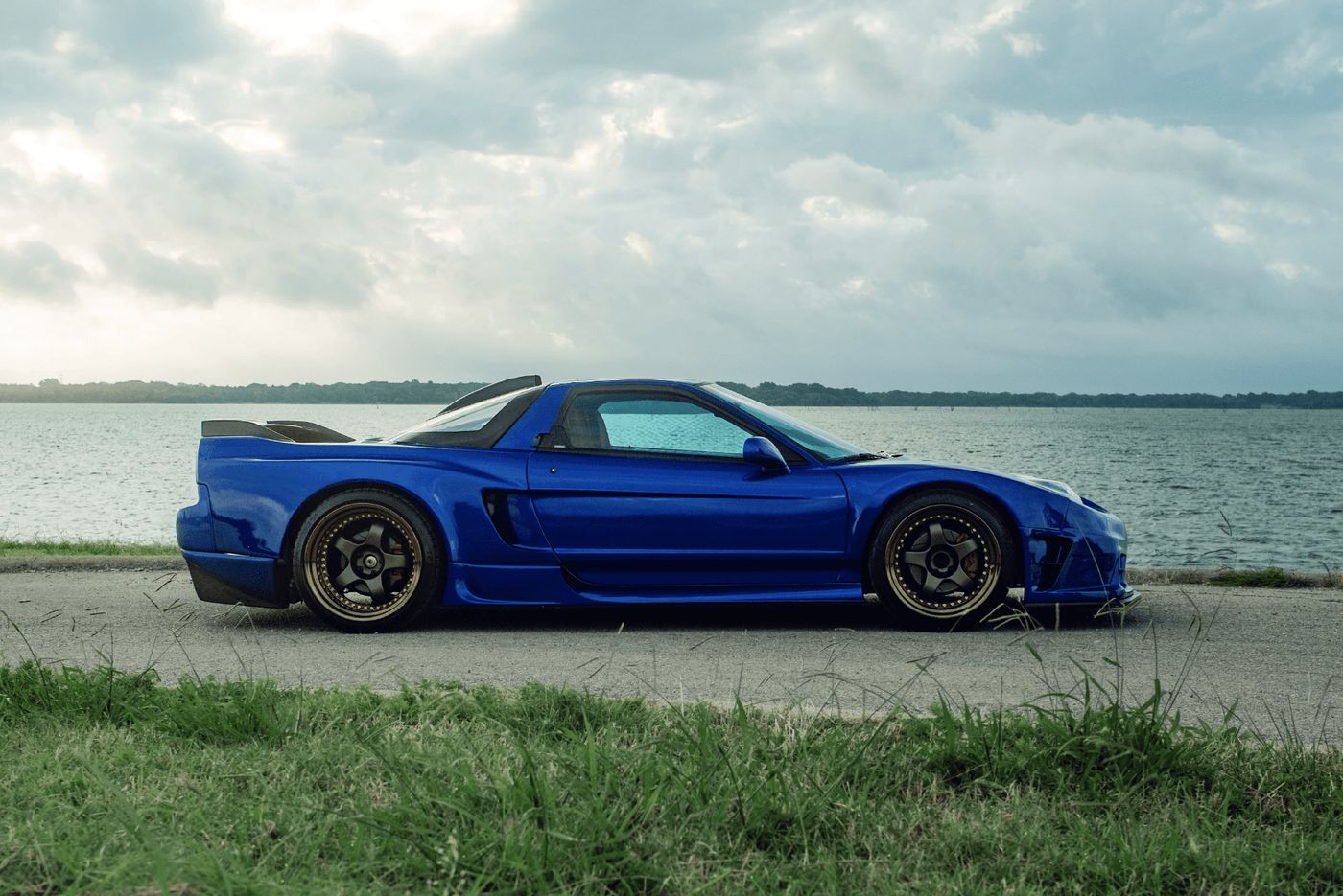 Side profile of the NSX on bronze Work Meister wheels